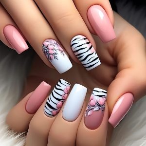 A Complete Set of 24 Short Square Fake Nails Featuring a Pink And Black-And-White Zebra Stripe Design, Including One Jelly Glue And One File, Perfect for Parties, Dancing, And Everyday Wear; They Are Removable And Reusable.